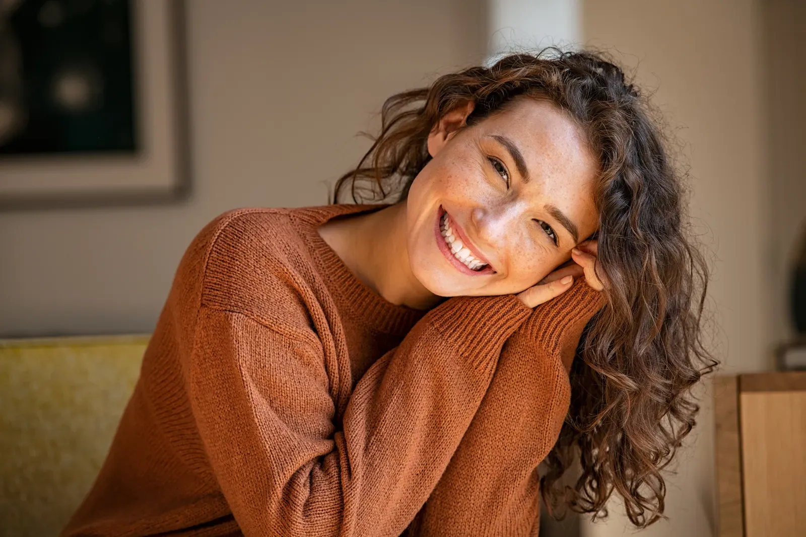 Cosmetic dentist in Montebello examining a patient's smile for veneers and teeth whitening treatment